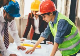 a team managing and communicating on a construction project drawings