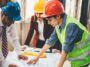 a team managing and communicating on a construction project drawings